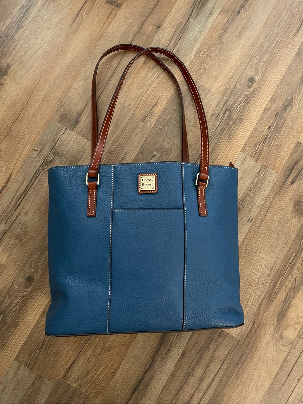 Dooney & Bourke Blue Leather Tote with Brown Straps like new.
